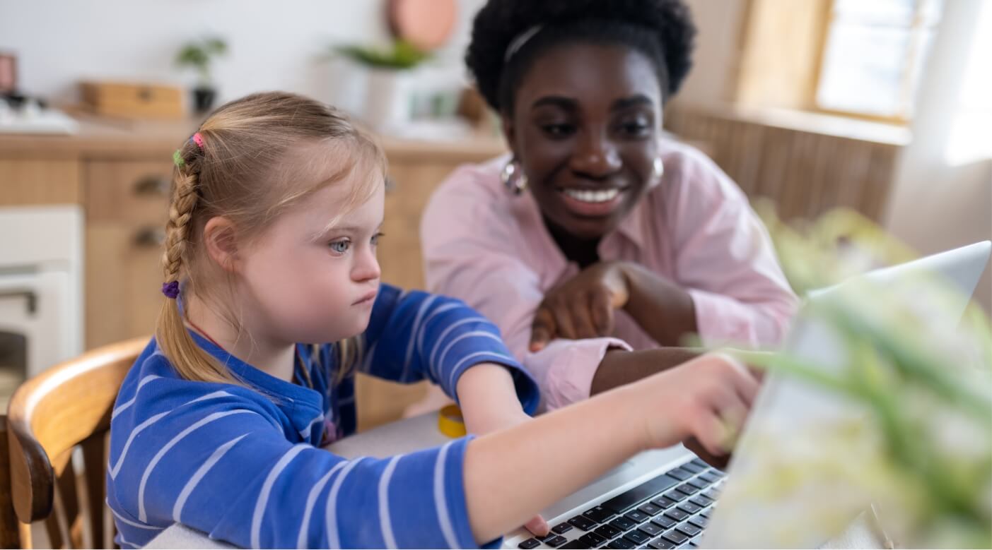 a teacher helping a special needs student