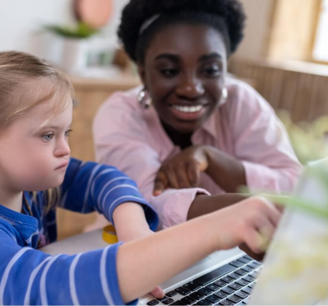 a teacher helping a special needs student