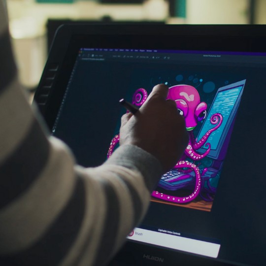 User drawing an octopus mascot, Cephy, on a digital tablet with Cephable’s assistive tech voice controls turned on