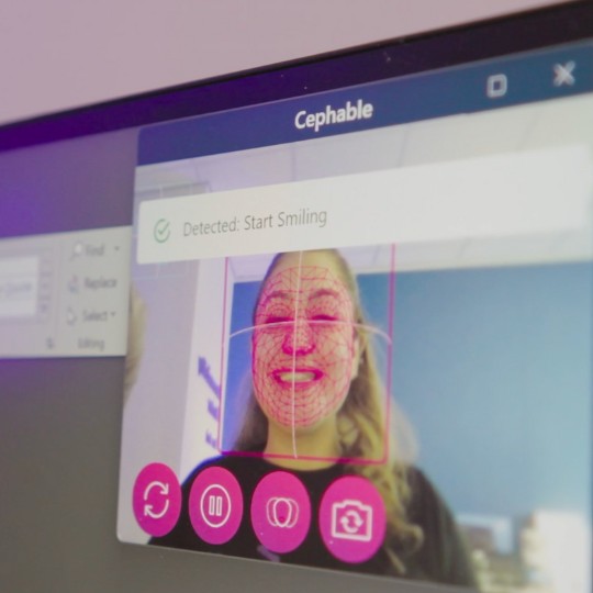 Cephable camera controls detecting a user’s smile as an expression-based control for digital input